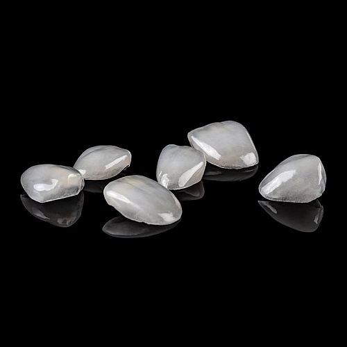 Almost weightless. Entirely individual. These ultra-thin porcelain veneers are handcrafted to refine shape, color, and... Almost weightless. Entirely individual. These ultra-thin porcelain veneers are handcrafted to refine shape, color, and...